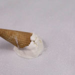ice cream cone dripping on shagreen leather